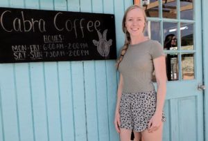 Hannah Johnson in front of Cabra Coffee