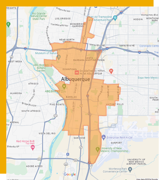 CommunityDevelopmentABQMap | Resource Tool for Startup and Small Businesses in New Mexico Map showing the city of Albuquerque with an orange highlighted area outlining downtown and surrounding neighborhoods on a street map